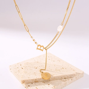 Double-layered 18k gold-plated titanium necklace with pearl, letter B and coin pendant