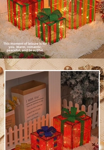 Close-up of LED glowing Christmas gift box with glitter bows and striped mesh details
