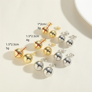Minimalist 14K gold and silver polished ball stud earrings in various sizes and weights