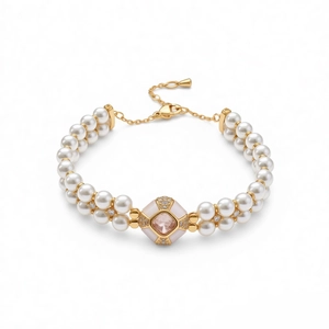 Luxueux bracelet à deux rangs de perles avec pierre rose carrée et fermoir doré