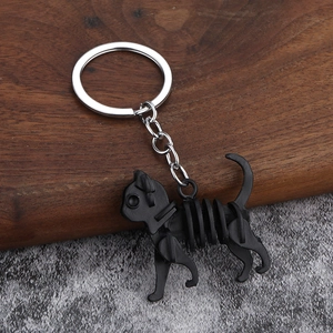 Kreativer schwarzer Katzen-Schlüsselanhänger mit Spiralgehäuse und silbernem Metallring