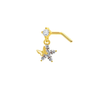 Macro shot of gold nose stud with butterfly pendant and sparkling zircon stones