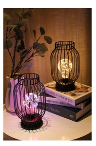 Close-up of lantern iron art LED lamps with warm and colorful lighting effects