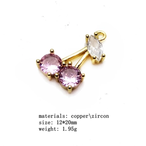 Detailed view of cherry pendant made of copper and pink zircon with 12x20mm size