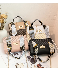 Collection of four printed square handbags with silk scarf handles and gold chain straps