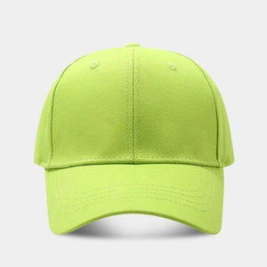Detail view of neon green baseball cap showing cotton twill fabric and curved brim