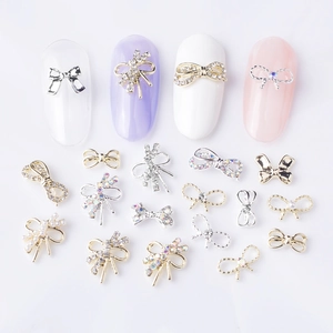 3D alloy bow nail art charms with rhinestones and pearls for professional DIY manicure