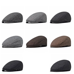 Classic men's striped beret caps in various colors and vintage tweed textures