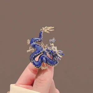 Exquisite golden dragon brooch with royal blue enamel finish for suits and coats