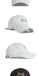 Detailed embroidery and gold trim on baseball cap with adjustable metal buckle