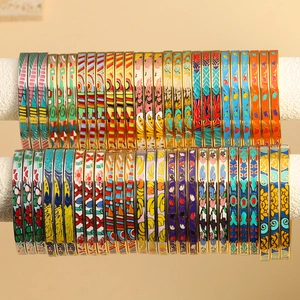 Titanium steel enamel bangles with floral and geometric patterns in gold and silver plating