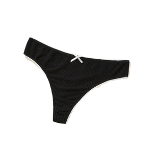Breathable black rib-knit thong with white lace trim and bow accent for women
