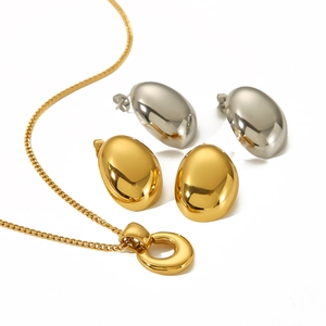 Minimalist oval stainless steel stud earrings and round necklace set in gold and silver