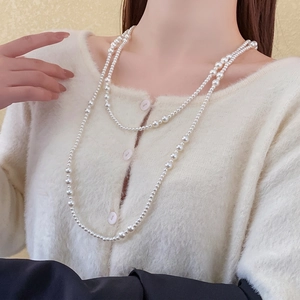 Elegant double-layered pearl long necklace featuring mixed-size pearls for vintage fashion