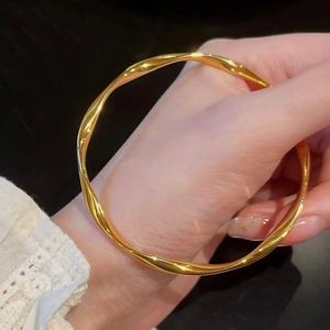 French retro Mobius gold bangle with 18k gold plating on elegant lace cuff