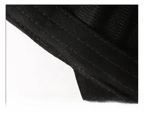 Detail of widened sweatband and reinforced stitching on a black long brim baseball cap
