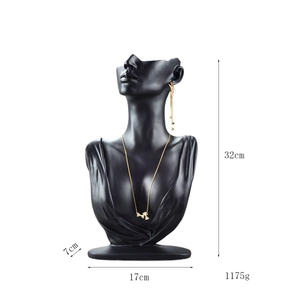 Detail view of black resin portrait jewelry bust with dimension and weight labels