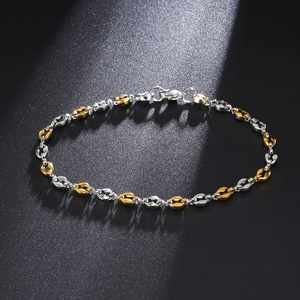 Macro view of 4.5mm stainless steel coffee bean chain with gold and silver links
