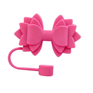 Detailed view of a rose red silicone bow straw topper for 10mm tumblers on white background