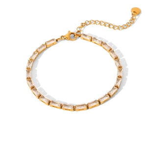Macro detail of gold stainless steel bracelet with rectangular zircon stones and clasp