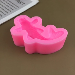 Detailed view of a pink koi fish silicone mold for 3D cake decorating and chocolate