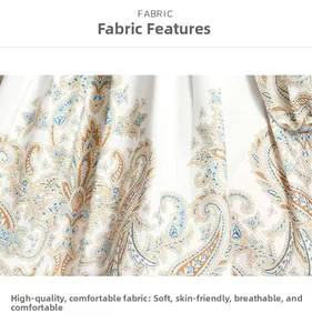 Close-up of paisley print fabric on V-neck dress featuring soft and breathable texture