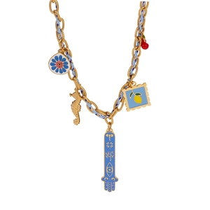 Detail of colorful charm necklace with gold chain and woven blue cord on white background