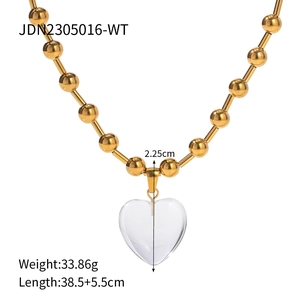 Detailed size specifications for a gold bead necklace with transparent heart pendant