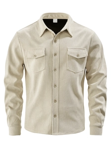 Detail view of beige corduroy shirt showing 100% polyester fabric and chest flap pockets