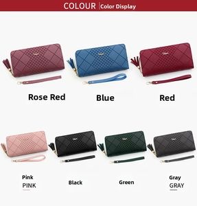 Showcase of seven elegant quilted leather long wallets with tassels and wrist straps