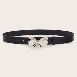 Classic black leather belt with a polished silver bow-shaped buckle for women's jeans
