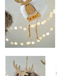 Detail of reindeer Christmas ornament with plush white fur ball and wood X-MAS tag