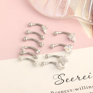 Silver stainless steel curved barbell set with cubic zirconia for eyebrow and ear piercings
