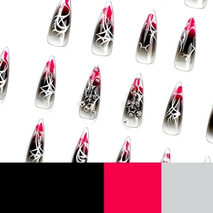 Gothic stiletto press-on nails with black-red gradient and silver cross charms