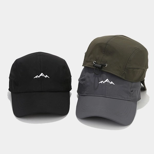 Detail of outdoor mountain embroidery on lightweight quick-dry adjustable caps