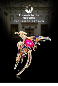 Detailed shot of Phoenix brooch featuring rose red gemstone and colorful enamel feathers