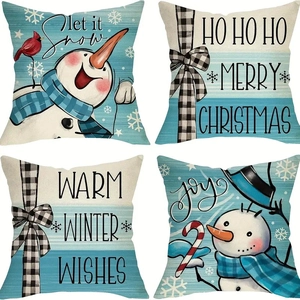 Detail view of 4-piece set Christmas pillow covers with linen texture and winter motifs