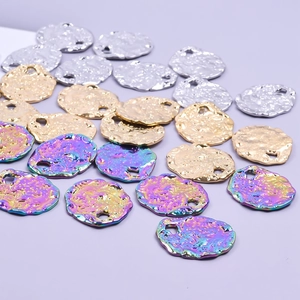 Lava texture oval titanium steel pendants in silver, gold and rainbow metallic finishes