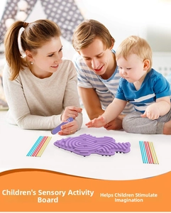 Family playing with a purple sensory activity board to boost kids' imagination and focus