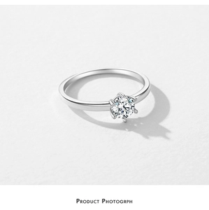 Detailed view of 925 sterling silver ring with classic six-prong brilliant cubic zirconia
