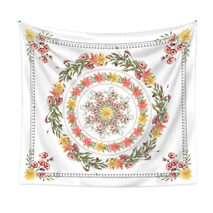 White floral mandala tapestry featuring pink lilies and green leaves with wavy border