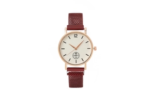 Detail view of rose gold quartz watch with burgundy magnetic mesh band and sub-dial