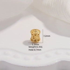 Macro view of gold S925 silver cylinder bead with hollow design and specific dimensions