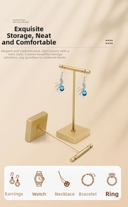Set of two gold T-bar metal earring stands with square bases for jewelry display