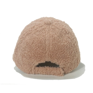 Pink lamb wool baseball cap with soft faux fur texture and warm minimalist design