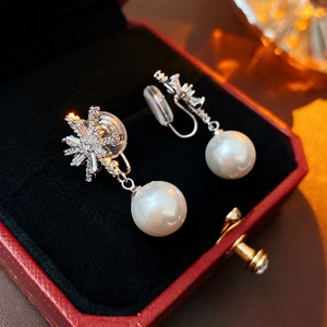 Zircon snowflake pearl ear clips with silver finish in a luxury velvet jewelry gift box