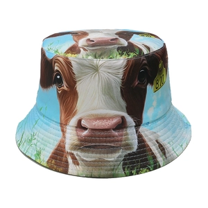 Sky blue bucket hat with cow print and ear tag detail for women summer fashion
