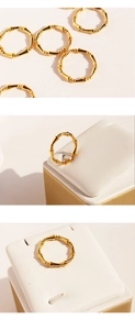 Detail view of the vintage gold bamboo joint ring showing the textured metallic surface