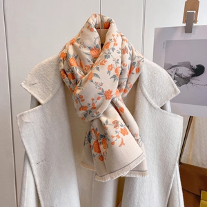 Elegant floral cashmere-feel scarf with orange flowers and fringe edges for winter