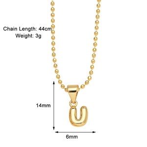 Macro detail of gold-plated letter U pendant showing 14mm size and 44cm chain length